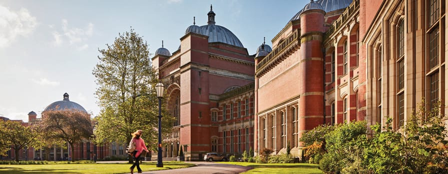 student walking in the university building