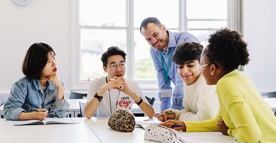 Students sitting on a table